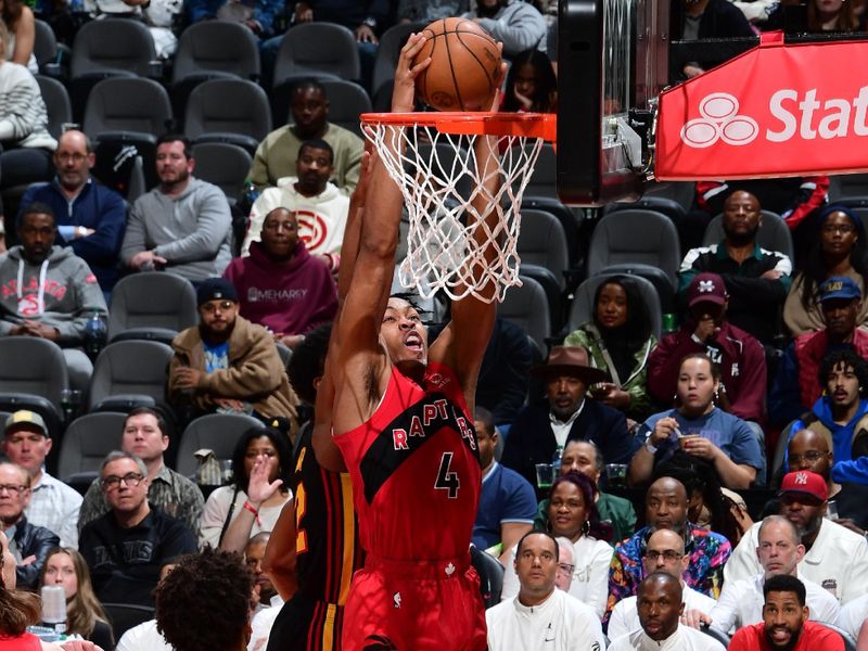 ATLANTA, GA - February 23:   Scottie Barnes #4 of the Toronto Raptors drives to the basket during the game against the Atlanta Hawks on February 23, 2024 at State Farm Arena in Atlanta, Georgia.  NOTE TO USER: User expressly acknowledges and agrees that, by downloading and/or using this Photograph, user is consenting to the terms and conditions of the Getty Images License Agreement. Mandatory Copyright Notice: Copyright 2024 NBAE (Photo by Scott Cunningham/NBAE via Getty Images)