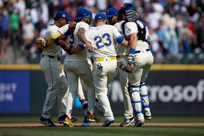 Jul 21, 2024; Seattle, Washington, USA; Seattle Mariners players dance after the win over the Houston Astros at T-Mobile Park. Mandatory Credit: John Froschauer-USA TODAY Sports