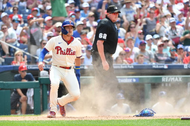 Jun 11, 2023; Philadelphia, Pennsylvania, USA;
Philadelphia Phillies second baseman Bryson Stott (5) sides safely into home against the Los Angeles Dodgers during the sixth inning at Citizens Bank Park. Mandatory Credit: Eric Hartline-USA TODAY Sports