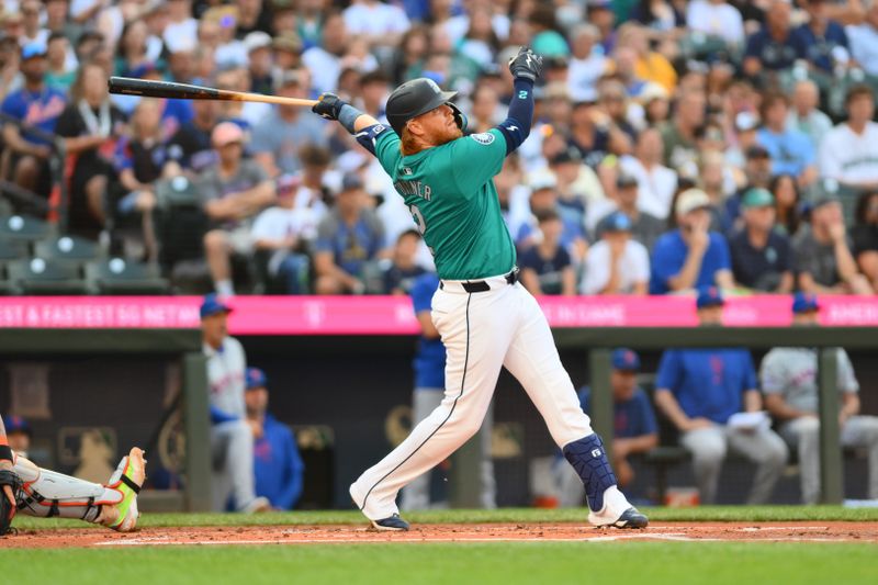 Aug 10, 2024; Seattle, Washington, USA; Seattle Mariners first baseman Justin Turner (2) hits an RBI double against the New York Mets during the first inning at T-Mobile Park. Mandatory Credit: Steven Bisig-USA TODAY Sports