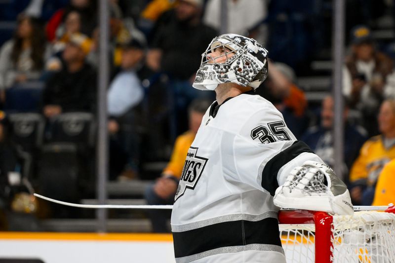 Nov 4, 2024; Nashville, Tennessee, USA;  Los Angeles Kings goaltender Darcy Kuemper (35) waits while the ice crew cleans the ice against the Nashville Predators during the first period at Bridgestone Arena. Mandatory Credit: Steve Roberts-Imagn Images