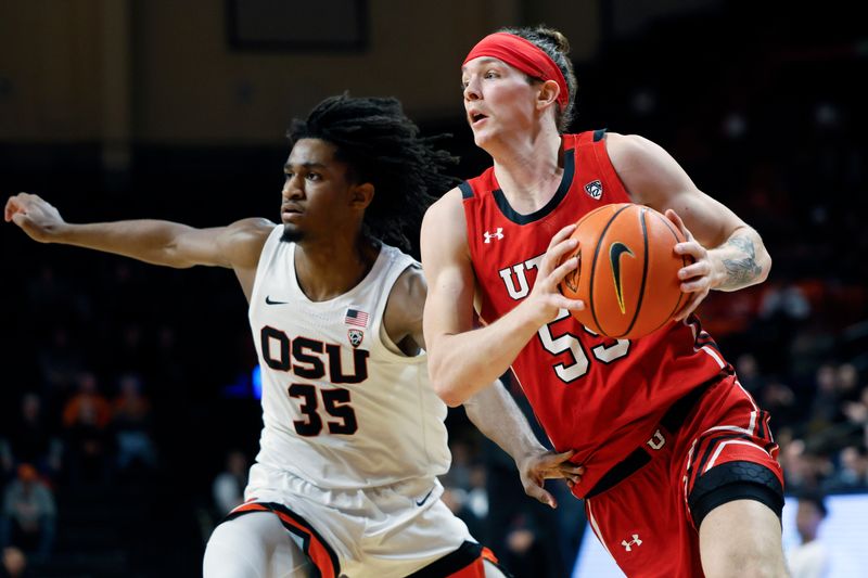 Jan 26, 2023; Corvallis, Oregon, USA; Utah Utes guard Gabe Madsen (55, right) drives to the basket against Oregon State Beavers forward Glenn Taylor Jr. (35) during the second half at Gill Coliseum. Mandatory Credit: Soobum Im-USA TODAY Sports