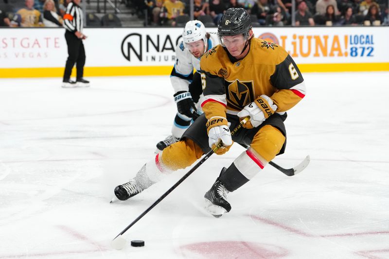 Sep 27, 2024; Las Vegas, Nevada, USA; Vegas Golden Knights defenseman Kaedan Korczak (6) skates ahead of Utah Hockey Club forward Michael Carcone (53) during the third period at T-Mobile Arena. Mandatory Credit: Stephen R. Sylvanie-Imagn Images