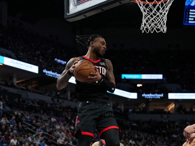 MINNEAPOLIS, MN -  FEBRUARY 4: Cam Whitmore #7 of the Houston Rockets grabs a rebound during the game against the Minnesota Timberwolves on February 4, 2024 at Target Center in Minneapolis, Minnesota. NOTE TO USER: User expressly acknowledges and agrees that, by downloading and or using this Photograph, user is consenting to the terms and conditions of the Getty Images License Agreement. Mandatory Copyright Notice: Copyright 2024 NBAE (Photo by Jordan Johnson/NBAE via Getty Images)