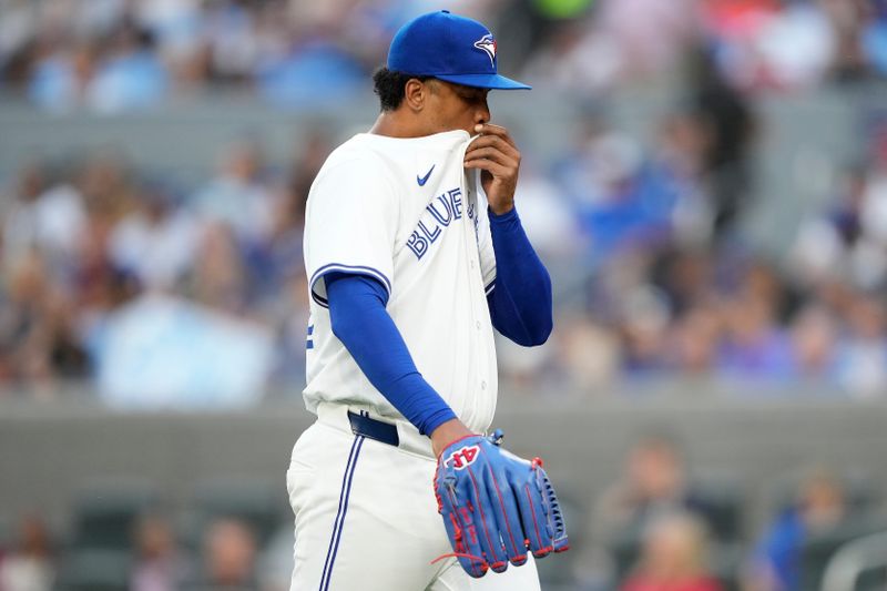 Jun 4, 2024; Toronto, Ontario, CAN; Toronto Blue Jays pitcher Genesis Cabrera (92) is pulled from the game against the Baltimore Orioles during the third inning at Rogers Centre. Mandatory Credit: John E. Sokolowski-USA TODAY Sports