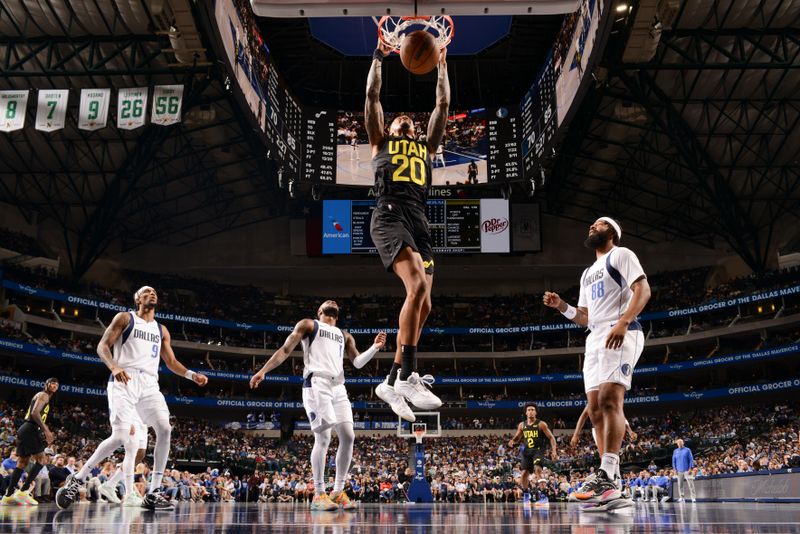 DALLAS, TX - OCTOBER 10: John Collins #20 of the Utah Jazz dunks the ball during the game against the Dallas Mavericks on October 10, 2024 at American Airlines Center in Dallas, Texas. NOTE TO USER: User expressly acknowledges and agrees that, by downloading and or using this photograph, User is consenting to the terms and conditions of the Getty Images License Agreement. Mandatory Copyright Notice: Copyright 2024 NBAE (Photo by Glenn James/NBAE via Getty Images)