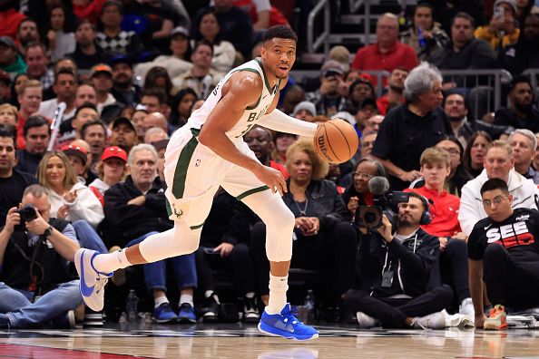 CHICAGO, ILLINOIS - NOVEMBER 30: Giannis Antetokounmpo #34 of the Milwaukee Bucks brings the ball up the court in the game against the Chicago Bulls at the United Center on November 30, 2023 in Chicago, Illinois. NOTE TO USER: User expressly acknowledges and agrees that, by downloading and or using this photograph, User is consenting to the terms and conditions of the Getty Images License Agreement. (Photo by Justin Casterline/Getty Images)