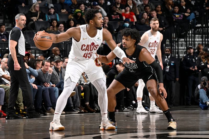 BROOKLYN, NY - FEBRUARY 8: Donovan Mitchell #45 of the Cleveland Cavaliers dribbles the ball during the game against the Brooklyn Nets on February 8, 2024 at the Barclays Center in Brooklyn, New York. NOTE TO USER: User expressly acknowledges and agrees that, by downloading and/or using this Photograph, user is consenting to the terms and conditions of the Getty Images License Agreement. Mandatory Copyright Notice: Copyright 2024 NBAE (Photo by David Dow/NBAE via Getty Images)