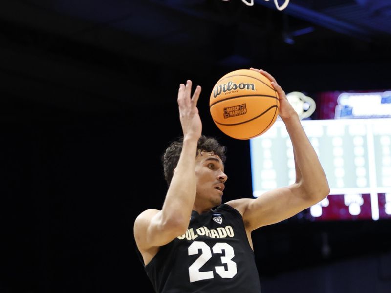 Mar 20, 2024; Dayton, OH, USA; Colorado Buffaloes forward Tristan da Silva (23) collects the ball in the first half at UD Arena. Mandatory Credit: Rick Osentoski-USA TODAY Sports