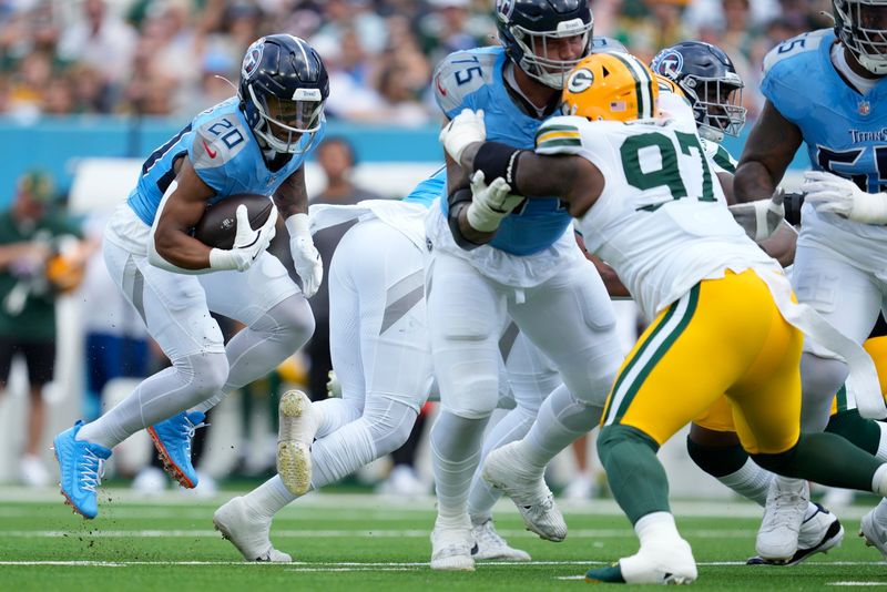 Tennessee Titans' Tony Pollard runs during the first half of an NFL football game against the Green Bay Packers Sunday, Sept. 22, 2024, in Nashville, Tenn. (AP Photo/George Walker IV)