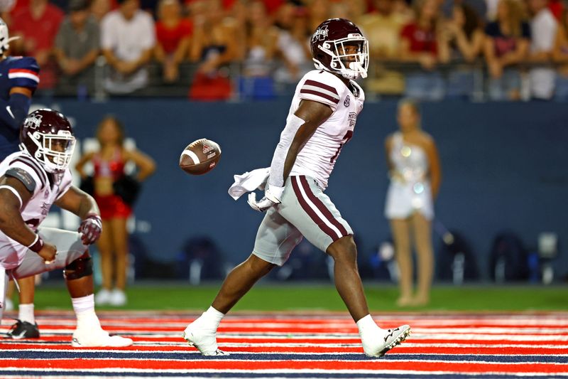 Sep 10, 2022; Tucson, Arizona, USA; Mississippi State Bulldogs running back Jo'quavious Marks (7) scores a touchdown during the first half against the Arizona Wildcats at Arizona Stadium. Mandatory Credit: Mark J. Rebilas-USA TODAY Sports