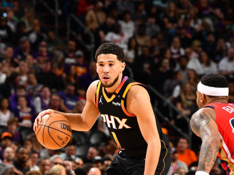 PHOENIX, AZ - FEBRUARY 28:  Devin Booker #1 of the Phoenix Suns dribbles the ball during the game against the New Orleans Pelicans on February 28, 2025 at PHX Arena in Phoenix, Arizona. NOTE TO USER: User expressly acknowledges and agrees that, by downloading and or using this photograph, user is consenting to the terms and conditions of the Getty Images License Agreement. Mandatory Copyright Notice: Copyright 2025 NBAE (Photo by Barry Gossage/NBAE via Getty Images)