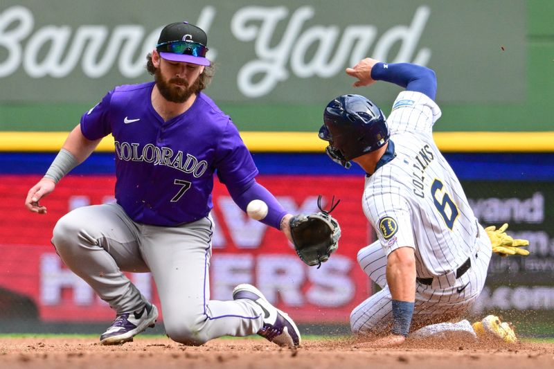 Sep 8, 2024; Milwaukee, Wisconsin, USA; Milwaukee Brewers left fielder Isaac Collins (6) steals second base as the ball gets past Colorado Rockies second baseman Brendan Rodgers (7) in the second inning at American Family Field. Mandatory Credit: Benny Sieu-Imagn Images