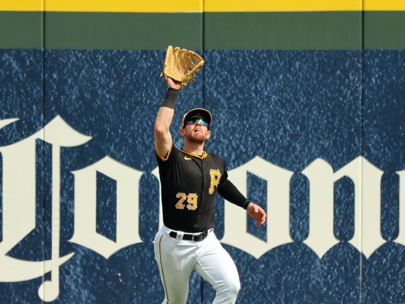 Mar 1, 2024; Bradenton, Florida, USA; Pittsburgh Pirates outfielder Billy McKinney (29) catches a fly ball during the third inning against the Tampa Bay Rays at LECOM Park. Mandatory Credit: Kim Klement Neitzel-USA TODAY Sports