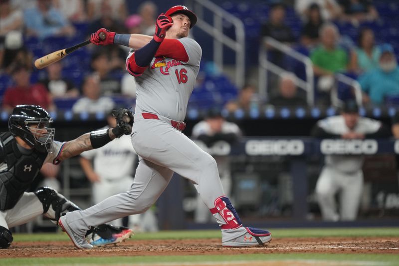 Aug 20, 2025; Miami, Florida, USA;  St. Louis Cardinals third baseman Nolan Gorman (16) gets crossed-up on a pitch in the fourth inning against the Miami Marlins at loanDepot Park. Mandatory Credit: Jim Rassol-Imagn Images