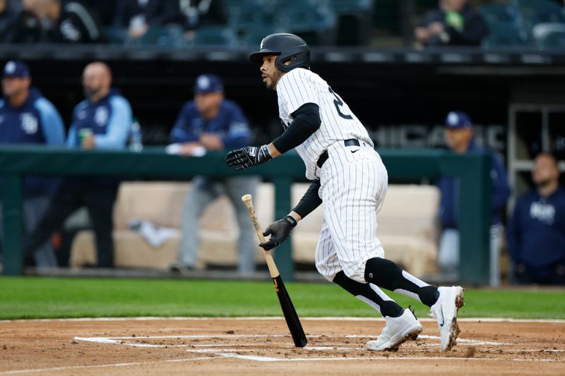 Apr 26, 2024; Chicago, Illinois, USA; Chicago White Sox left fielder Tommy Pham (28) singles against the Tampa Bay Rays during the first inning at Guaranteed Rate Field. Mandatory Credit: Kamil Krzaczynski-USA TODAY Sports