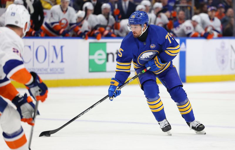 Mar 14, 2024; Buffalo, New York, USA;  Buffalo Sabres defenseman Connor Clifton (75) looks to make a pass during the second period against the New York Islanders at KeyBank Center. Mandatory Credit: Timothy T. Ludwig-USA TODAY Sports