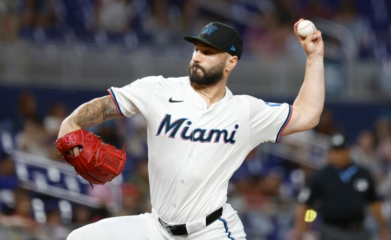 Apr 16, 2024; Miami, Florida, USA;  Miami Marlins pitcher Tanner Scott (66) pitches against the San Francisco Giants during the ninth inning at loanDepot Park. Mandatory Credit: Rhona Wise-USA TODAY Sports