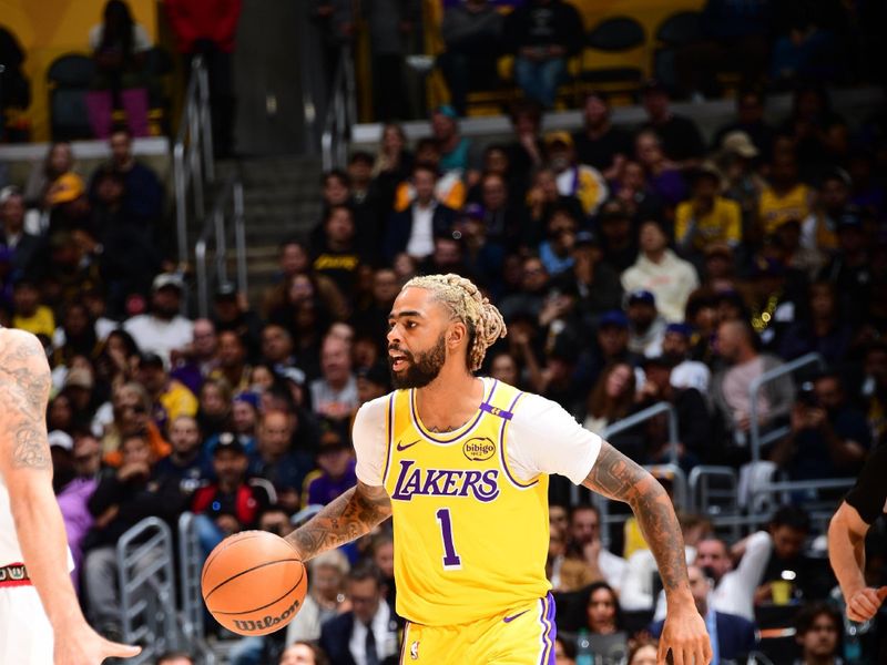 LOS ANGELES, CA - NOVEMBER 13: D'Angelo Russell #1 of the Los Angeles Lakers dribbles the ball during the game against the Memphis Grizzlies on November 13, 2024 at Crypto.Com Arena in Los Angeles, California. NOTE TO USER: User expressly acknowledges and agrees that, by downloading and/or using this Photograph, user is consenting to the terms and conditions of the Getty Images License Agreement. Mandatory Copyright Notice: Copyright 2024 NBAE (Photo by Adam Pantozzi/NBAE via Getty Images)