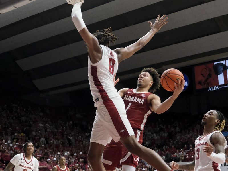 Mar 9, 2024; Tuscaloosa, Alabama, USA;  Alabama guard Mark Sears (1) takes a shot in the lane against Arkansas forward Chandler Lawson (8) at Coleman Coliseum. Alabama came from behind to win on overtime 92-88. Mandatory Credit: Gary Cosby Jr.-USA TODAY Sports