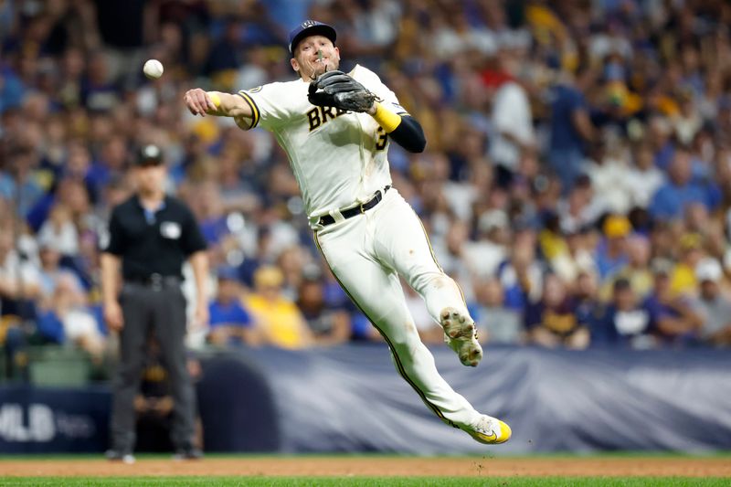 Oct 4, 2023; Milwaukee, Wisconsin, USA; Milwaukee Brewers third baseman Josh Donaldson (3) throws to first in the seventh inning against the Arizona Diamondbacks during game two of the Wildcard series for the 2023 MLB playoffs at American Family Field. Mandatory Credit: Kamil Krzaczynski-USA TODAY Sports