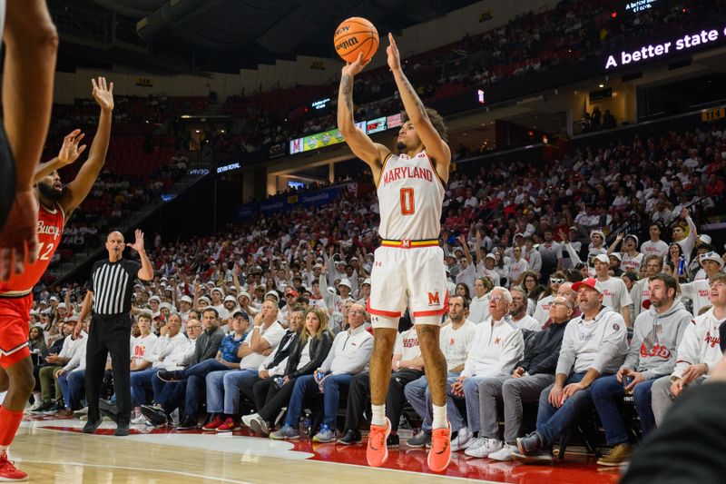 Dec 4, 2024; College Park, Maryland, USA; Maryland Terrapins guard Ja'Kobi Gillespie (0) takes a three point shot during the second half Ohio State Buckeyes at Xfinity Center. Mandatory Credit: Reggie Hildred-Imagn Images