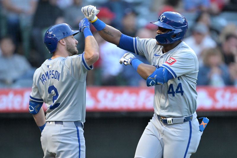 May 9, 2024; Anaheim, California, USA;  Kansas City Royals outfielder Dairon Blanco (44) is congratulated by outfielder Garrett Hampson (2) after hitting a two-run home run against the Los Angeles Angels in the third inning at Angel Stadium. Mandatory Credit: Jayne Kamin-Oncea-USA TODAY Sports