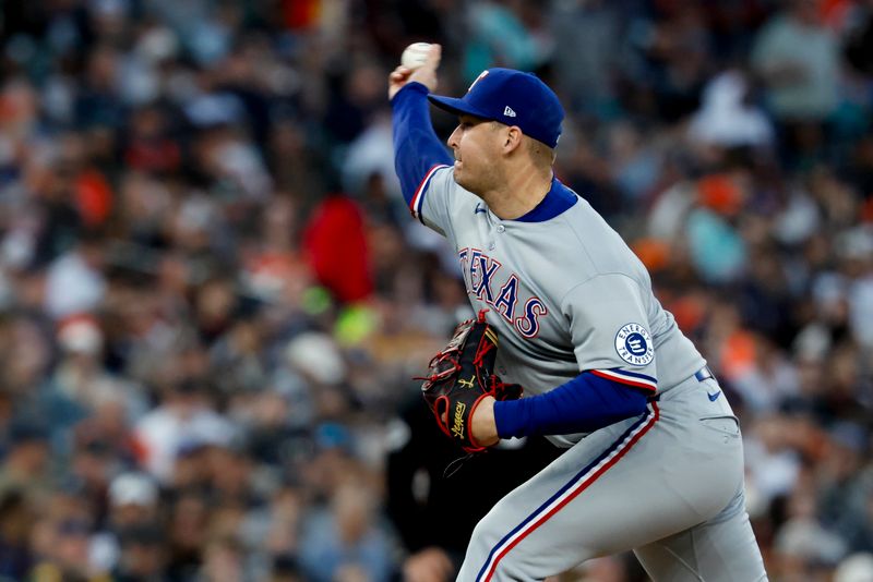 May 9, 2025; Detroit, Michigan, USA;  Texas Rangers relief pitcher Jacob Webb (71) pitches in the eighth inning against the Detroit Tigers at Comerica Park. Mandatory Credit: Rick Osentoski-Imagn Images