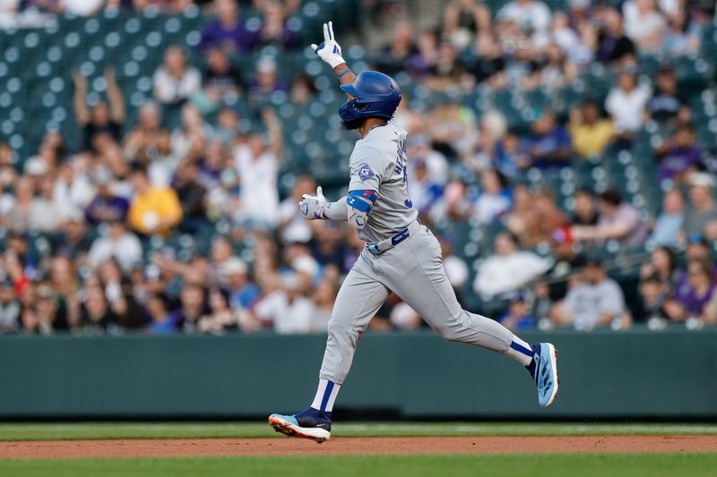 Sep 27, 2024; Denver, Colorado, USA; Los Angeles Dodgers left fielder Teoscar Hernandez (37) gestures as he rounds the bases on a two run home run in the first inning against the Colorado Rockies at Coors Field. Mandatory Credit: Isaiah J. Downing-Imagn Images