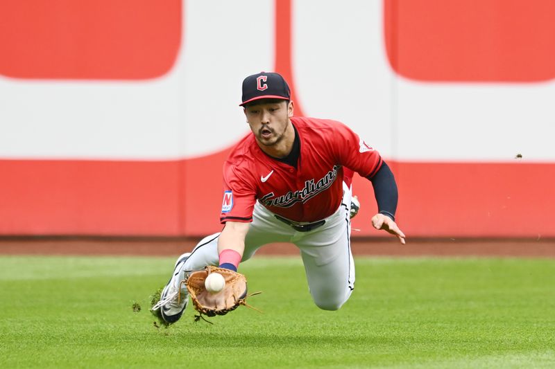 Aug 25, 2024; Cleveland, Ohio, USA; Cleveland Guardians left fielder Steven Kwan (38) catches a ball hit by Texas Rangers third baseman Ezequiel Duran (not pictured) during the third inning at Progressive Field. Mandatory Credit: Ken Blaze-USA TODAY Sports