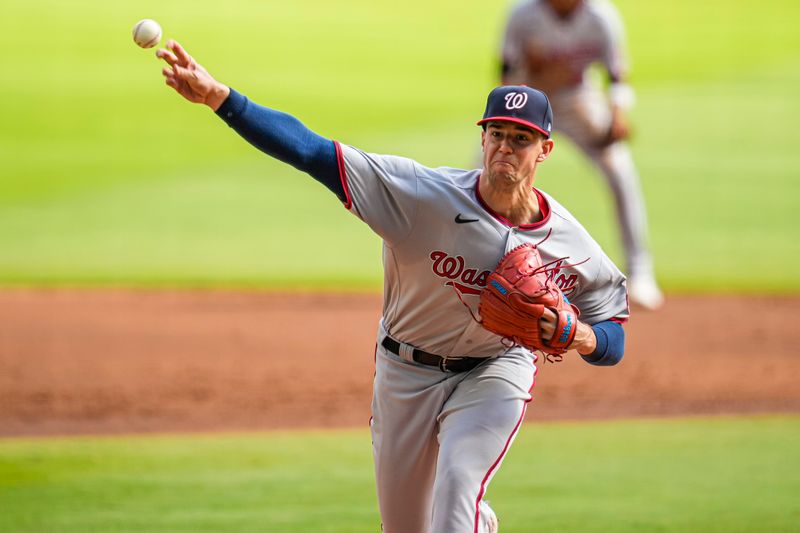 Oct 1, 2023; Cumberland, Georgia, USA; Washington Nationals starting pitcher Jackson Rutledge (79) pitches against the Atlanta Braves during the first inning at Truist Park. Mandatory Credit: Dale Zanine-USA TODAY Sports