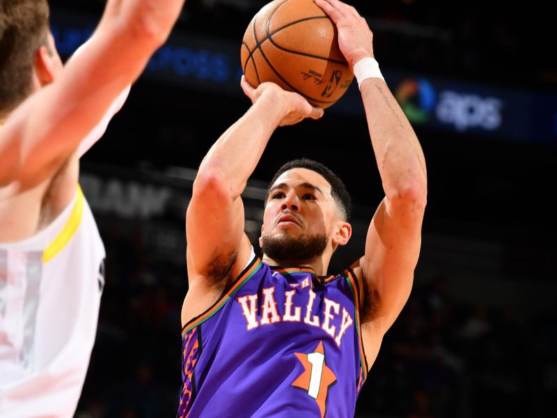 PHOENIX, AZ - JANUARY 11: Devin Booker #1 of the Phoenix Suns shoots the ball during the game against the Utah Jazz on January 11, 2025 at Footprint Center in Phoenix, Arizona. NOTE TO USER: User expressly acknowledges and agrees that, by downloading and or using this photograph, user is consenting to the terms and conditions of the Getty Images License Agreement. Mandatory Copyright Notice: Copyright 2025 NBAE (Photo by Barry Gossage/NBAE via Getty Images)