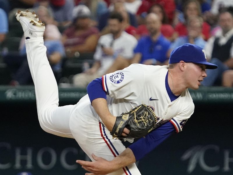 Sep 19, 2024; Arlington, Texas, USA; Texas Rangers pitcher Walter Pennington (52) follows through on a pitch during the fourth inning against the Toronto Blue Jays at Globe Life Field. Mandatory Credit: Raymond Carlin III-Imagn Images