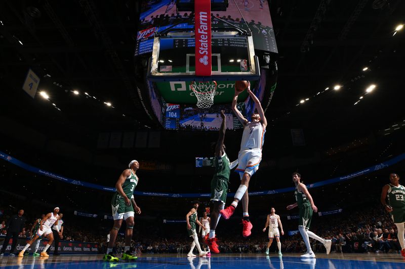 OKLAHOMA CITY, OK - APRIL 12: Chet Holmgren #7 of the Oklahoma City Thunder shoots the ball during the game against the Milwaukee Bucks on April 12, 2024 at Paycom Arena in Oklahoma City, Oklahoma. NOTE TO USER: User expressly acknowledges and agrees that, by downloading and or using this photograph, User is consenting to the terms and conditions of the Getty Images License Agreement. Mandatory Copyright Notice: Copyright 2024 NBAE (Photo by Zach Beeker/NBAE via Getty Images)