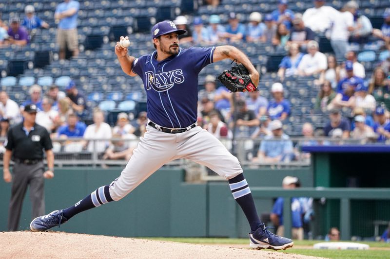 Jul 16, 2023; Kansas City, Missouri, USA; Tampa Bay Rays starting pitcher Zach Eflin (24) delivers a pitch against the Kansas City Royals in the first inning at Kauffman Stadium. Mandatory Credit: Denny Medley-USA TODAY Sports