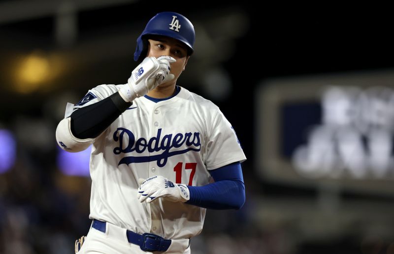 May 30, 2025; Los Angeles, California, USA; Los Angeles Dodgers designated hitter Shohei Ohtani (17) rounds the bases after hitting a home run during the sixth inning against the New York Yankees at Dodger Stadium. Mandatory Credit: Jason Parkhurst-Imagn Images