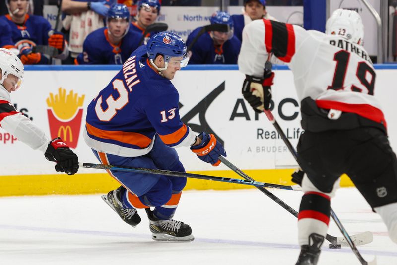 Mar 16, 2024; Elmont, New York, USA;  New York Islanders center Mathew Barzal (13) controls the puck against the Ottawa Senators during the second period at UBS Arena. Mandatory Credit: Thomas Salus-USA TODAY Sports