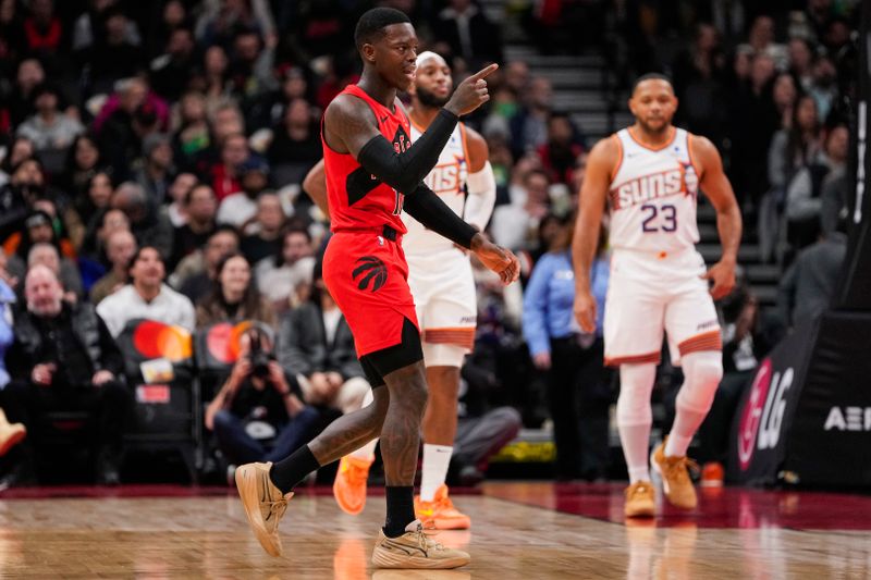 TORONTO, ON - NOVEMBER 29: Dennis Schroder #17 of the Toronto Raptors celebrates after scoring a three-point basket against the Phoenix Suns during first half action at the Scotiabank Arena on November 29, 2023 in Toronto, Ontario, Canada. NOTE TO USER: User expressly acknowledges and agrees that, by downloading and/or using this Photograph, user is consenting to the terms and conditions of the Getty Images License Agreement. (Photo by Andrew Lahodynskyj/Getty Images)