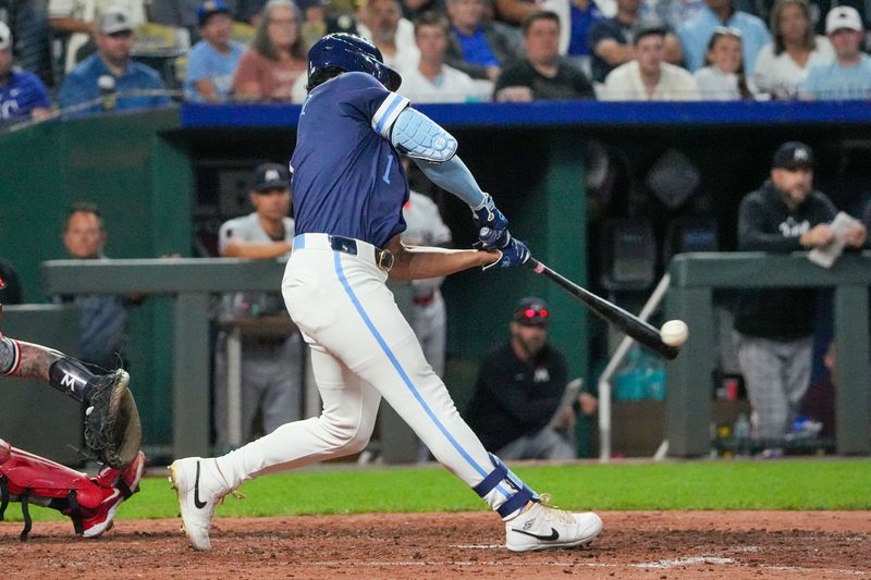 Sep 6, 2024; Kansas City, Missouri, USA; Kansas City Royals designated hitter MJ Melendez (1) singles against the Minnesota Twins in the fifth inning at Kauffman Stadium. Mandatory Credit: Denny Medley-Imagn Images