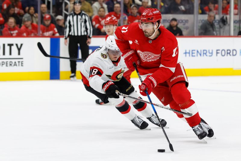 Jan 7, 2025; Detroit, Michigan, USA; Detroit Red Wings center Dylan Larkin (71) skates with the puck in overtime against the Ottawa Senators at Little Caesars Arena. Mandatory Credit: Rick Osentoski-Imagn Images