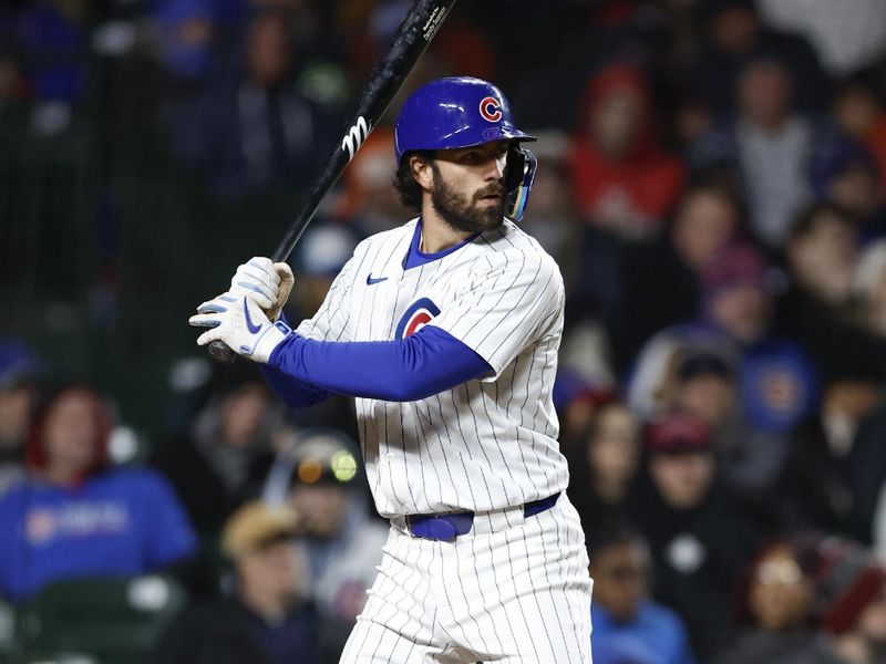 Apr 24, 2024; Chicago, Illinois, USA; Chicago Cubs shortstop Dansby Swanson (7) bats against the Houston Astros during the fifth inning at Wrigley Field. Mandatory Credit: Kamil Krzaczynski-USA TODAY Sports