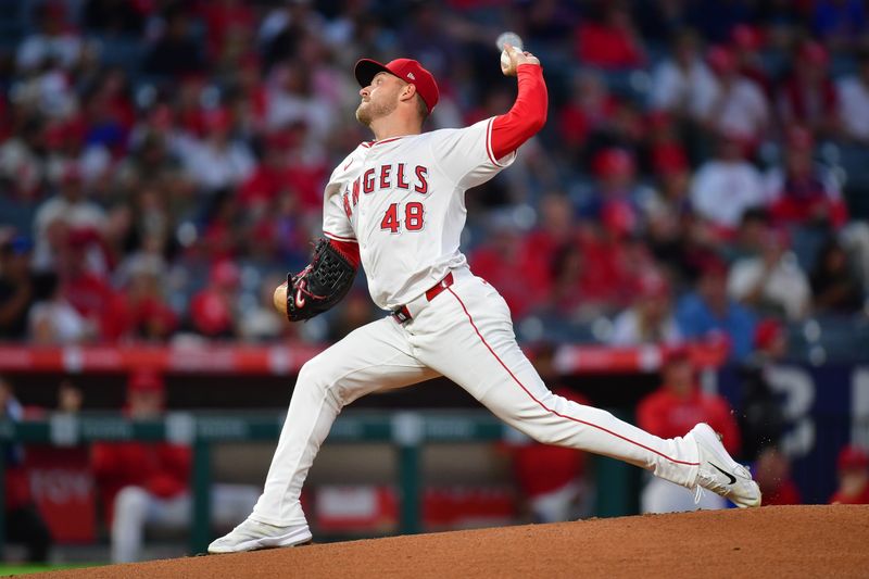 Sep 27, 2024; Anaheim, California, USA;  Los Angeles Angels pitcher Reid Detmers (48) throws against the Texas Rangers during the first inning at Angel Stadium. Mandatory Credit: Gary A. Vasquez-Imagn Images