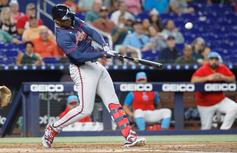 Sep 21, 2024; Miami, Florida, USA; Atlanta Braves right fielder Jorge Soler (2) hits a home run against the Miami Marlins in the second inning at loanDepot Park. Mandatory Credit: Rhona Wise-Imagn Images