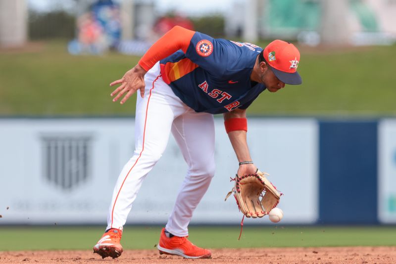 Feb 22, 2026; West Palm Beach, Florida, USA; Houston Astros shortstop Jeremy Pena (3) cannot catch a ground ball against St. Louis Cardinals right fielder Jordan Walker (not pictured) during the third inning at CACTI Park of the Palm Beaches. Mandatory Credit: Sam Navarro-Imagn Images