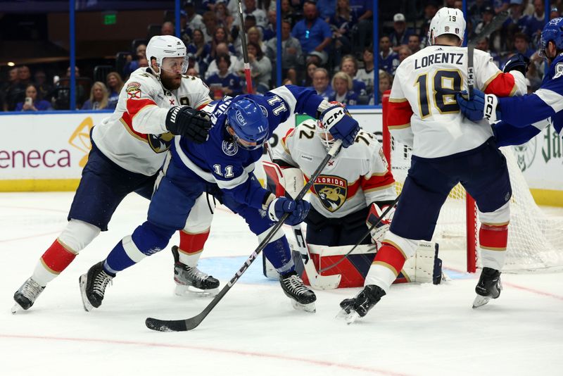 wApr 27, 2024; Tampa, Florida, USA; Florida Panthers defenseman Aaron Ekblad (5), goaltender Sergei Bobrovsky (72) and center Steven Lorentz (18) defend Tampa Bay Lightning center Luke Glendening (11) during the third period in game four of the first round of the 2024 Stanley Cup Playoffs at Amalie Arena. Mandatory Credit: Kim Klement Neitzel-USA TODAY Sports