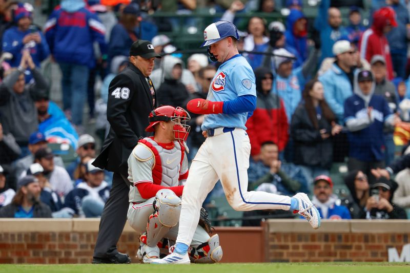 Apr 25, 2025; Chicago, Illinois, USA; Chicago Cubs center fielder Pete Crow-Armstrong (4) scores against the Philadelphia Phillies during the second inning at Wrigley Field. Mandatory Credit: Kamil Krzaczynski-Imagn Images