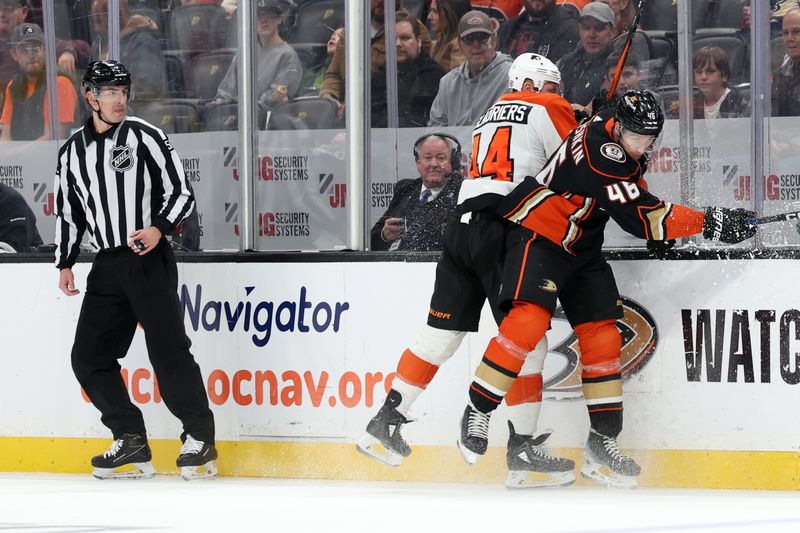 Nov 10, 2023; Anaheim, California, USA; Philadelphia Flyers left wing Nicolas Deslauriers (44) checks Anaheim Ducks defenseman Ilya Lyubushkin (46) during the first period at Honda Center. Mandatory Credit: Kiyoshi Mio-USA TODAY Sports