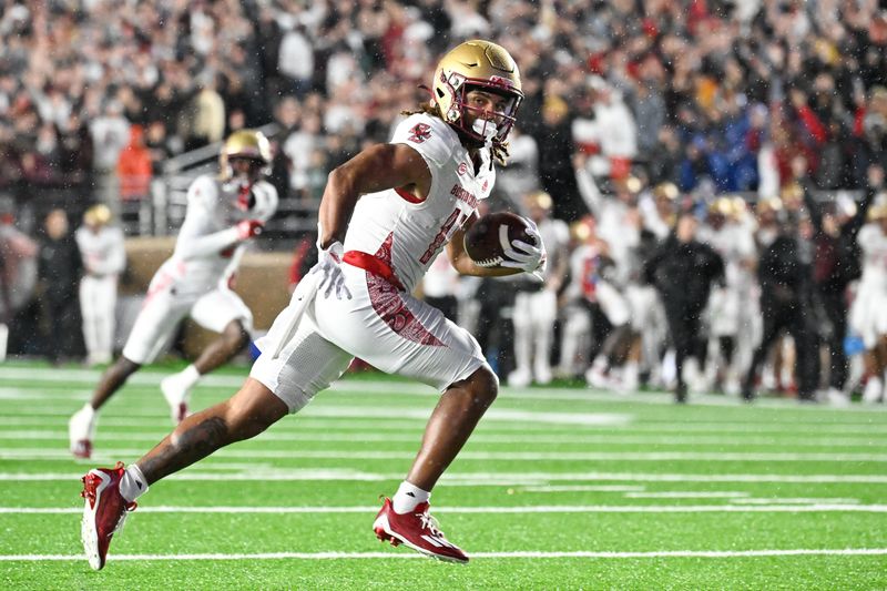 Sep 21, 2024; Chestnut Hill, Massachusetts, USA; Boston College Eagles wide receiver Lewis Bond (11) runs after the catch for a touchdown against the Michigan State Spartans during the second half at Alumni Stadium. Mandatory Credit: Eric Canha-Imagn Images