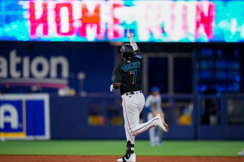 Jun 7, 2023; Miami, Florida, USA; Miami Marlins right fielder Jesus Sanchez (7) celebrates hitting a three run home run against the Kansas City Royals during the third inning at loanDepot Park. Mandatory Credit: Rich Storry-USA TODAY Sports