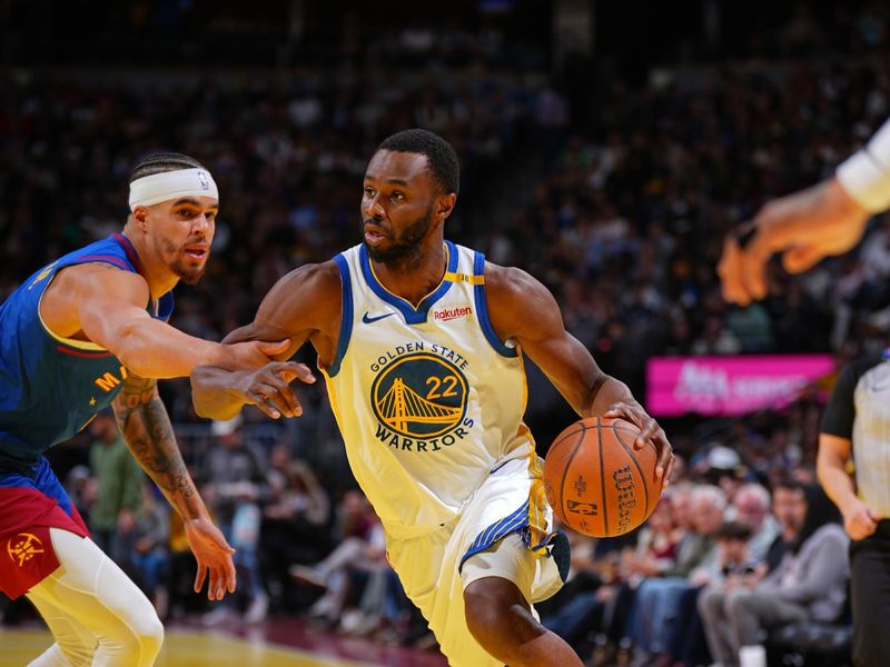 DENVER, CO - DECEMBER 3: Andrew Wiggins #22 of the Golden State Warriors drives to the basket during the game against the Denver Nuggets during the Emirates NBA Cup on December 3, 2024 at Ball Arena in Denver, Colorado. NOTE TO USER: User expressly acknowledges and agrees that, by downloading and/or using this Photograph, user is consenting to the terms and conditions of the Getty Images License Agreement. Mandatory Copyright Notice: Copyright 2024 NBAE (Photo by Garrett Ellwood/NBAE via Getty Images)